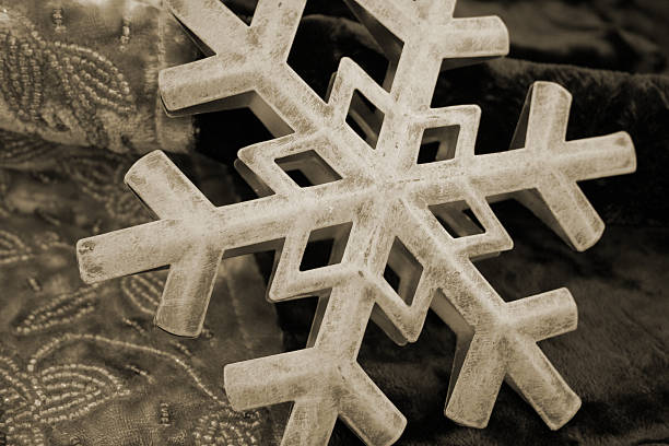 sepia snowflake stock photo