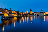 Charles Bridge at night, Old Town Tower of Charles Bridge, Prague, Czech Republic. Prague old town and iconic Charles bridge at night, Czech Republic. Charles Bridge (Karluv Most) and Old Town Tower.