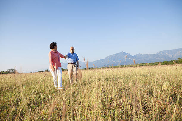 istock Playful couple walking in nature 181902118