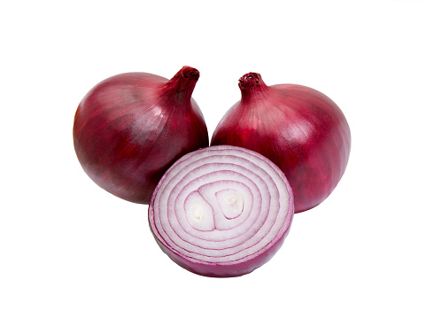 Red whole and sliced onion, isolated on white background