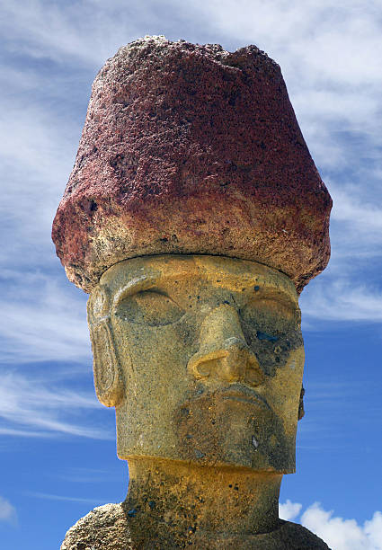 Ancient stone statues stand at Ahu Anakena on Easter Island.  These moais represent ancestors of the early Polynesian settlers to the island.