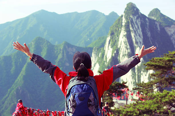 istock woman hiker open arms 181905182