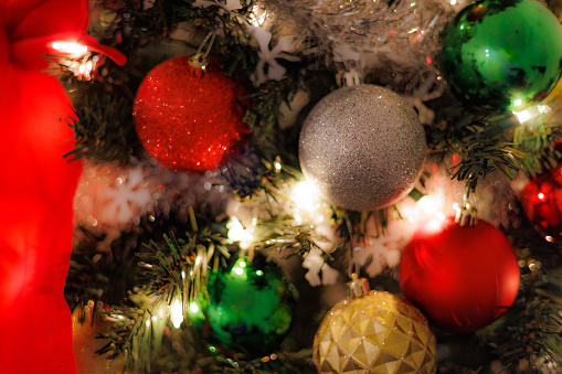 Red, Green, Gold and Silver decorations adorn this Christmas tree