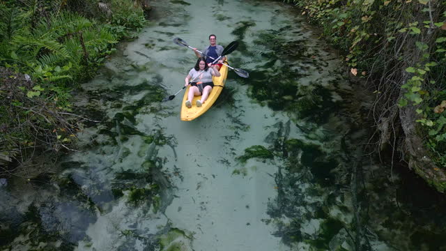 Father and Daughter - Family Kayaking Down Florida Springs - Florida Freshwater River Springs