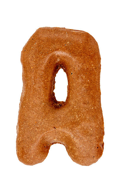 istock alphabet from chocolate cookie isolated on white background with 181920569