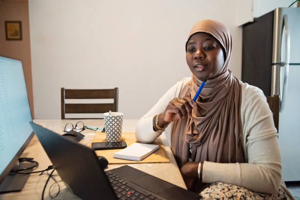 istock Muslim black woman working from home. 1819213812