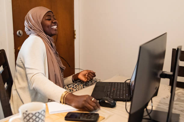 istock Muslim black woman on video call working from home. 1819216496