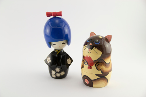 Japanese doll with funny russian nested doll.