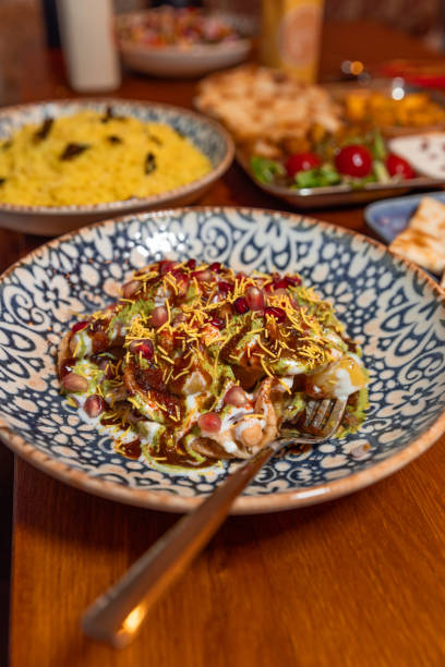 istock Indian Food Appetizer Snack on Restaurant table with Masala Chai Tea 1819232068