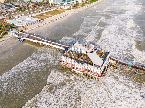 Daytona, FL, USA - November 18, 2023: Aerial photo Daytona Beach Main Street fishing pier and Joes Crab Shack