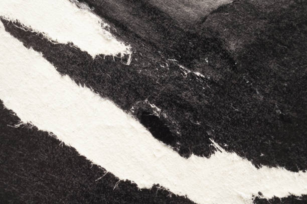 istock Old grunge ripped torn black paper poster surface texture background 1819305898