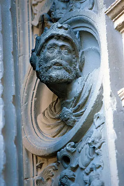 Tondo with man's image in stone, relief of the Front of the chapel of El Salvador of Ubeda, Jaen province, Spain