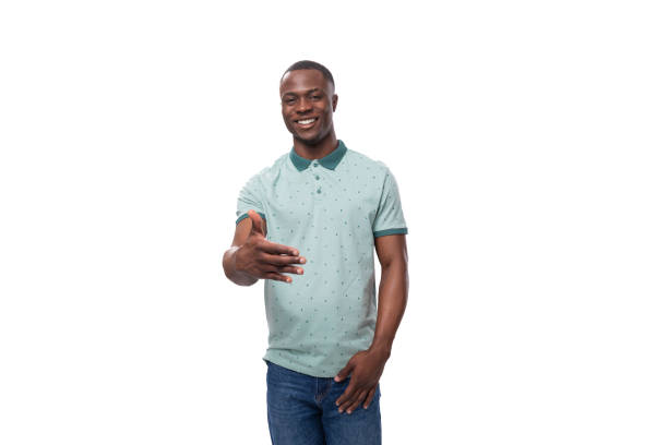 istock young handsome smiling african man dressed casually extends his hand for acquaintance 1819314291