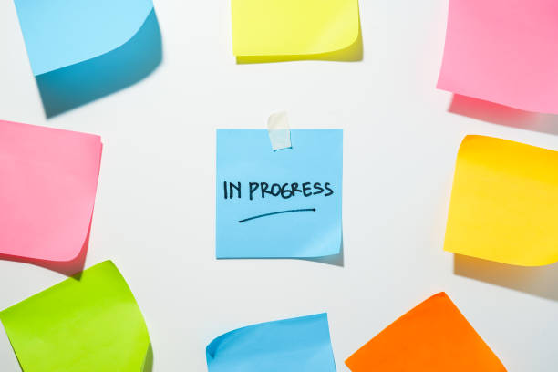 istock Motivational words for personal development, in progress, inspirational handwriting on sticky notes 1819343715