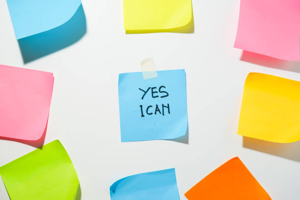 istock Motivational words for personal development, yes I can, inspirational handwriting on sticky notes 1819344060