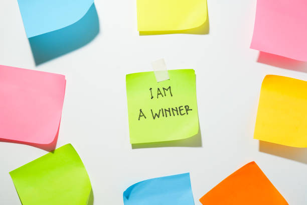 istock Motivational words for personal development, I am a winner, inspirational handwriting on sticky notes 1819344101