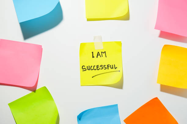 istock Motivational words for personal development, I am successful, inspirational handwriting on sticky notes 1819344628