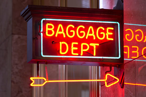 istock Red Neon Sign Indoor Depot Signage Arrow Points Baggage Dept 181936300