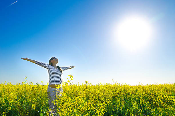 istock woman in the field 181936452