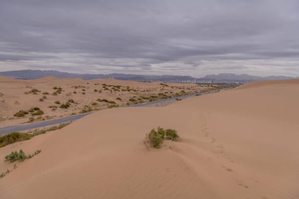 View on Wuhai City, Inner Mongolia, China from the desert. Horizontal background, copy space for text