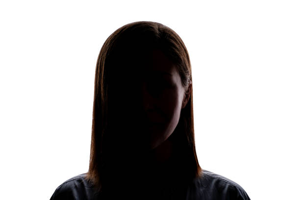 istock Dark silhouette of a young woman on white background front view. 1819393191