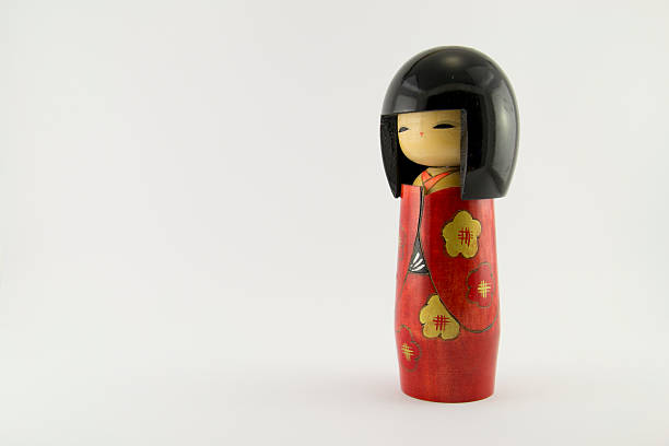 Japanese doll also known as Kokeshi doll.