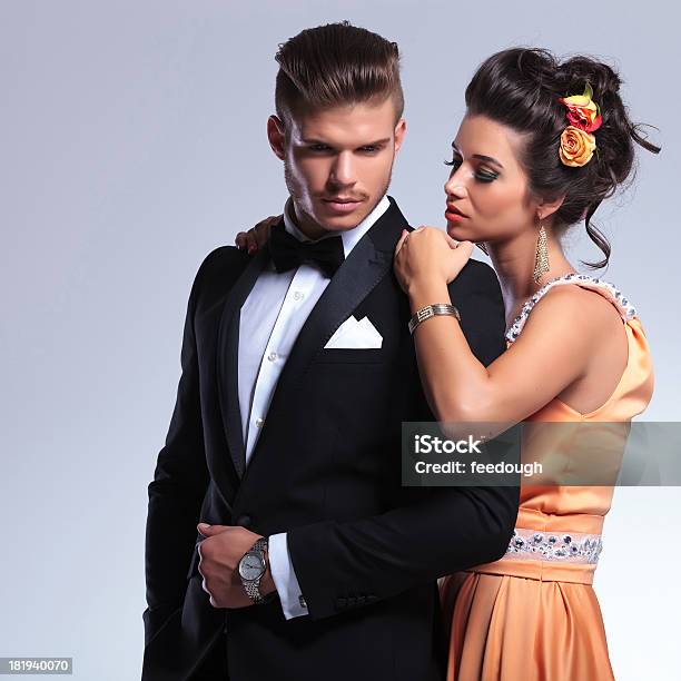 Fashion Couple Where Woman Is With Hands On His Shoulders Stock Photo - Download Image Now