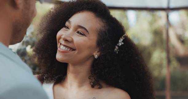 istock Love, dancing and bride at wedding for commitment and in celebration at a outdoor marriage ceremony or event for trust. Husband, wife and happy woman with smile and care for partner together 1819424890