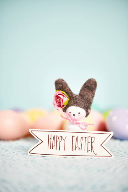istock Easter background with cute handmade bunny and HAPPY EASTER sign 1819469577