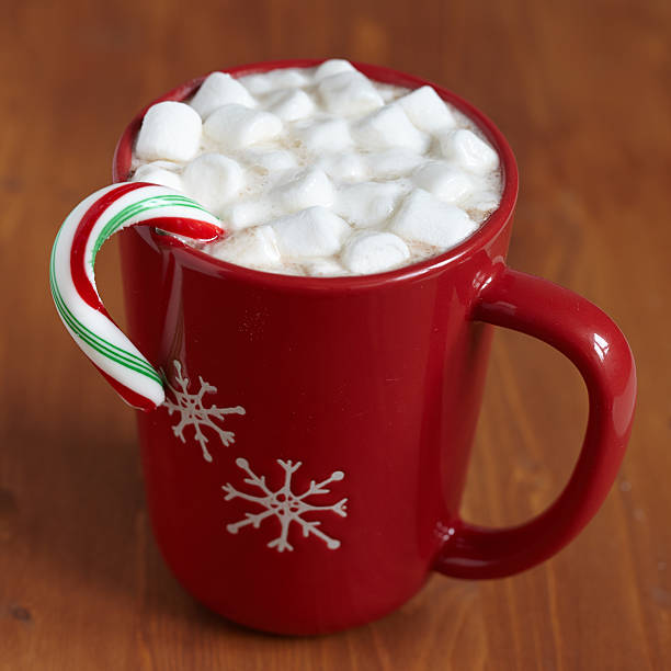 istock Red mugs with hot chocolate and marshmallows 181947293