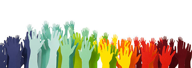 Many multi coloured hands waving and celebrating Many hands cut from multi coloured card waving and celebrating. A Mexican style wave, shallow depth of field. Isolated on a pure white background, no dot in the white area so no need to cut-out e.g. can be dropped directly on to a white web page seemlessly. doing the wave stock pictures, royalty-free photos & images