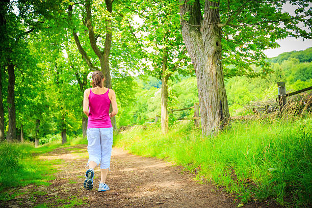 istock young woman jogging 181954990