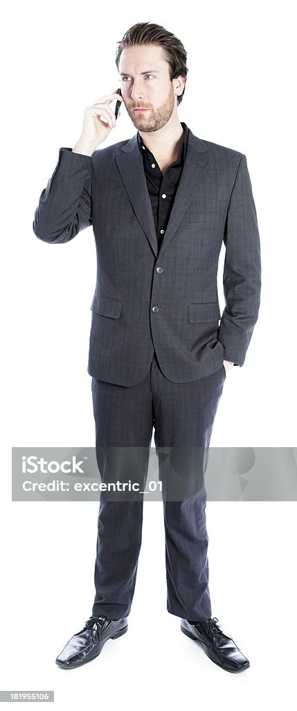 Uomo d'affari che indossa abito grigio su sfondo bianco - Foto stock royalty-free di Adulto