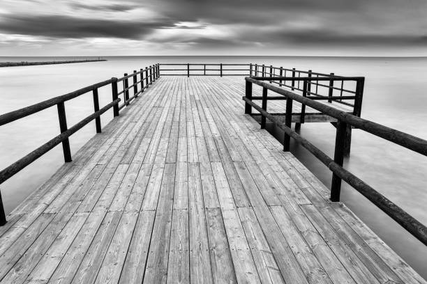 istock Santa Pola salt flats pier 1819553162