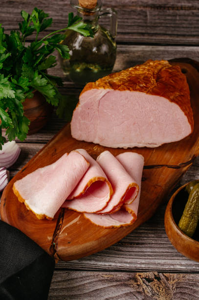 istock ham with spices cut on a wooden board 1819557419