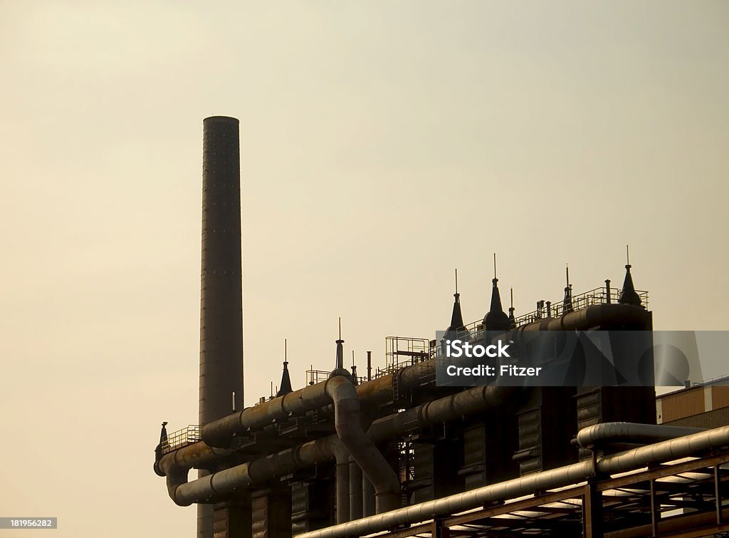 beautiful industry huge chimney on an old and rotten coal mine in germany. Architecture Stock Photo