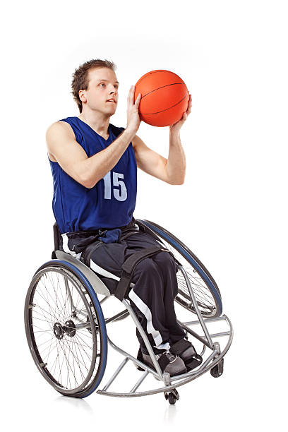 rotelle giocatore di basket - basket su sedia a rotelle foto e immagini stock