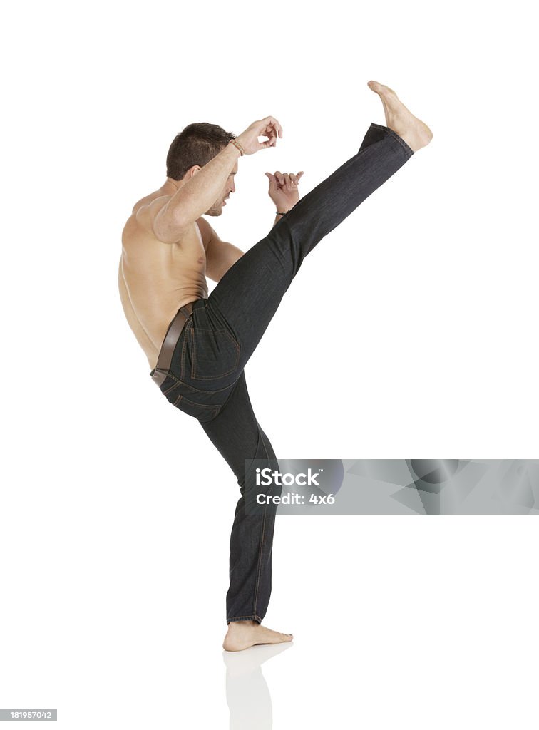 Man practicing capoeira 20-29 Years Stock Photo