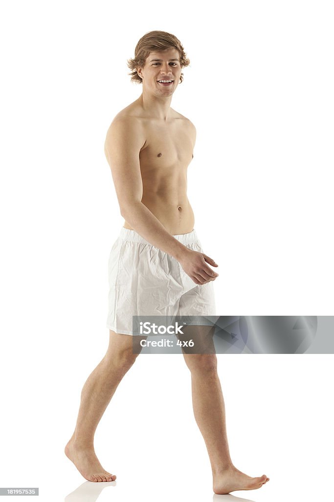 上半身裸 man walking - ボクサーショーツのロイヤリティフリーストックフォト