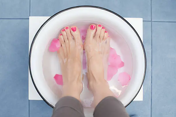 Woman's feet in foot soak