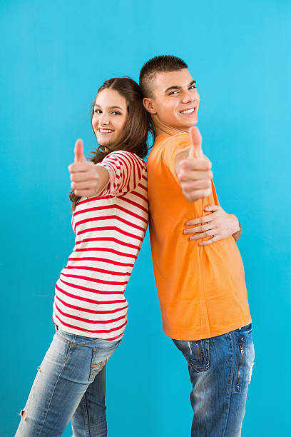 istock Succesfull students showing thumbs up 181957853