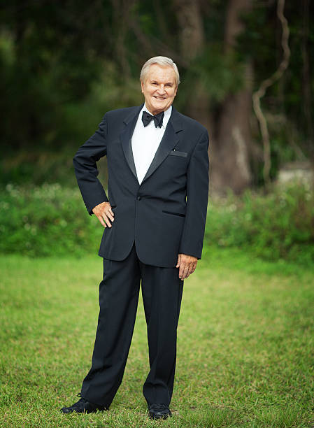 wealthy senior senior caucasian man wearing a tuxedo outdoors tuxedo photos stock pictures, royalty-free photos & images