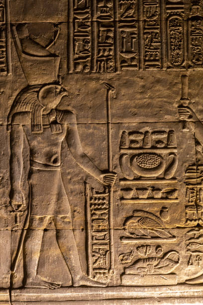 istock Horus and other egyptian hieroglyphs on golden wall 1819585147