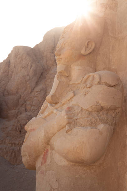istock Statue of a pharaoh in Hatshepsut temple during sunset. 1819585153