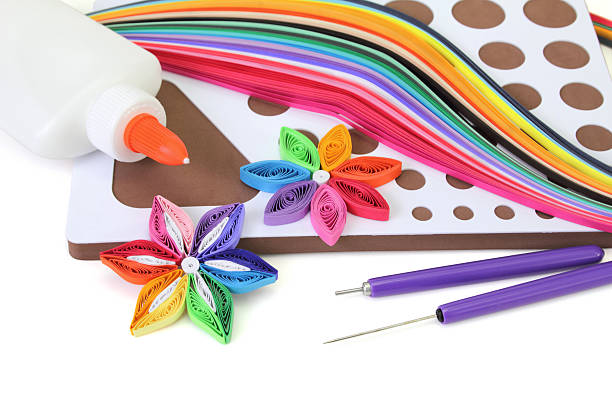 Quilling tools "Basic quilling tools and quilling paper. Pure white background, soft shadows." paper quilling stock pictures, royalty-free photos & images