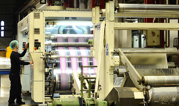 Printing presses Printing presses large machine stock pictures, royalty-free photos & images