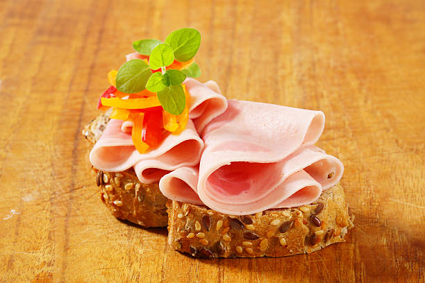 istock slice of bread with ham and peppers 181959126