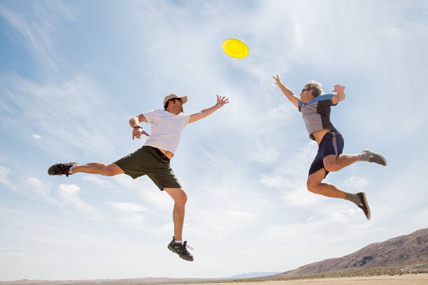 istock Jumping to Catch a Frisbee 181959293
