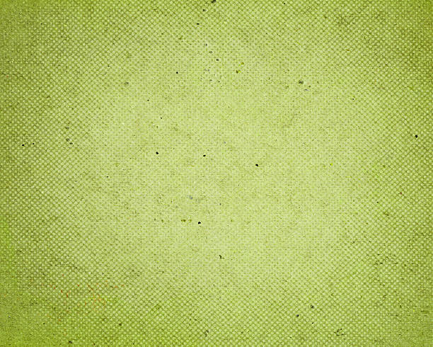 istock distressed green paper with halftone 181959777