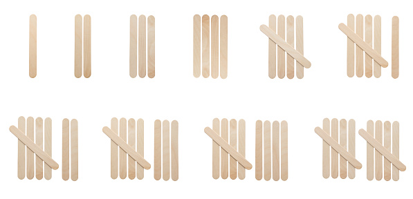 1 to 10 tally marks symbol made from wooden popsicles stick  isolated on white background. Education and learning concept.
